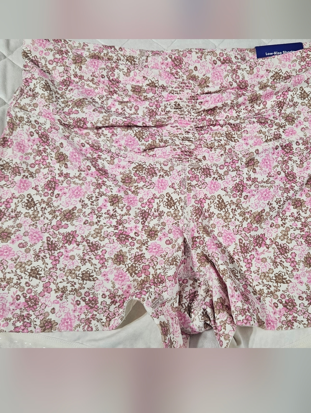 JoyLab™ athletic skorts in a pink floral pattern.